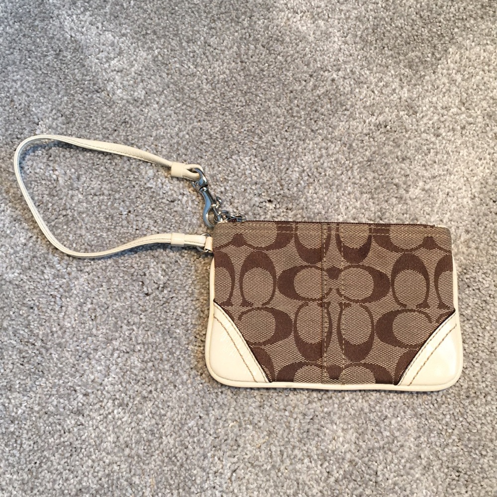 Coach wristlet. White and brown.